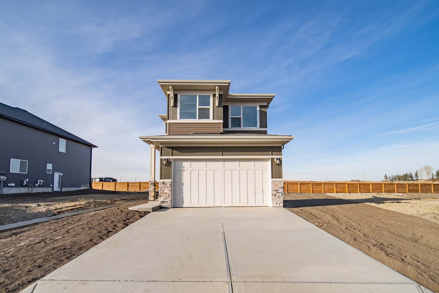 A quick possession home in Chinook Gate by Brookfield Residential, located at 1242 Chinook Winds Circle SW