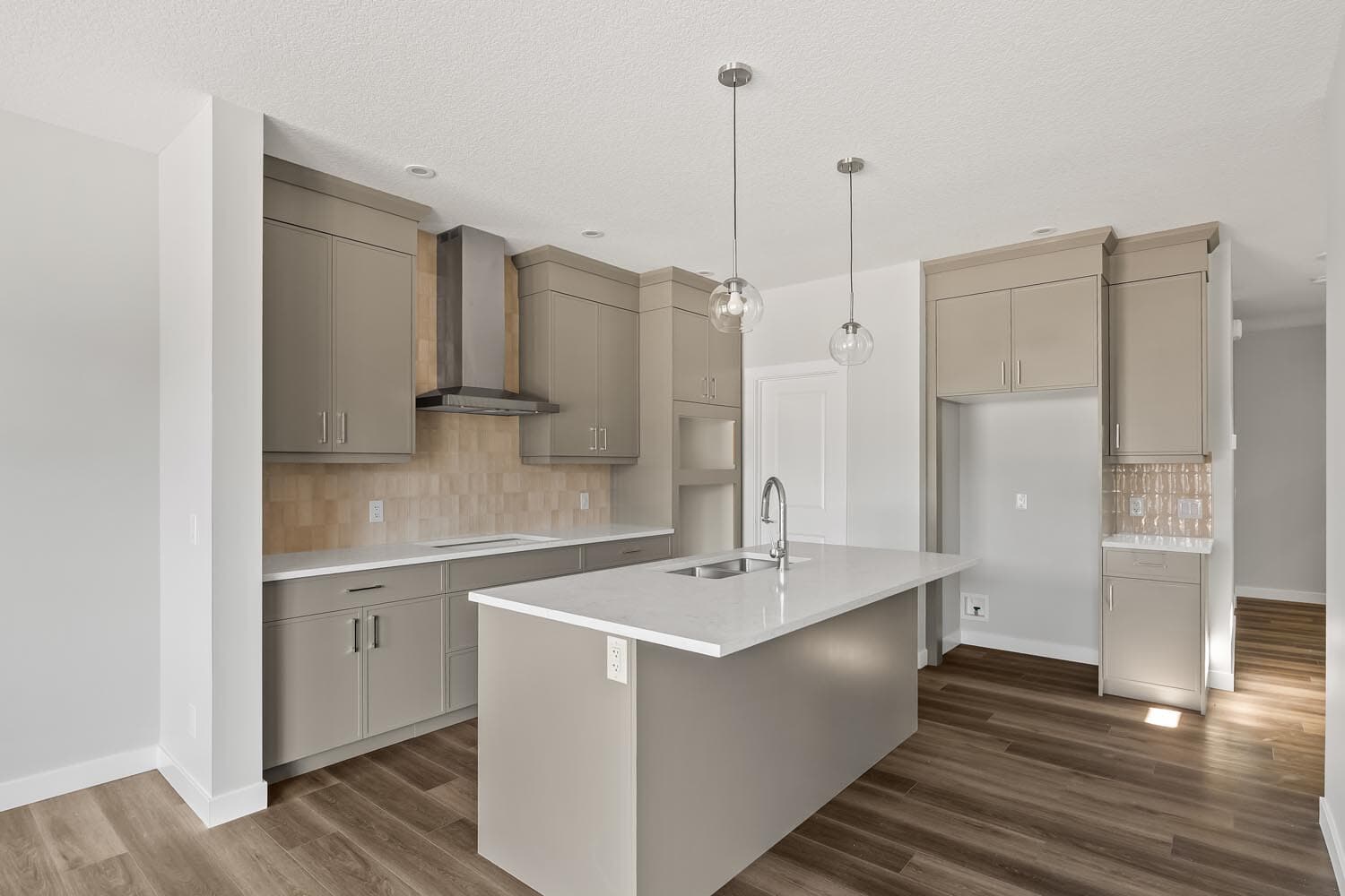 A photo of the front garage quick possession home at 144 Creekstone Circle SW in Creekstone by Brookfield Residential