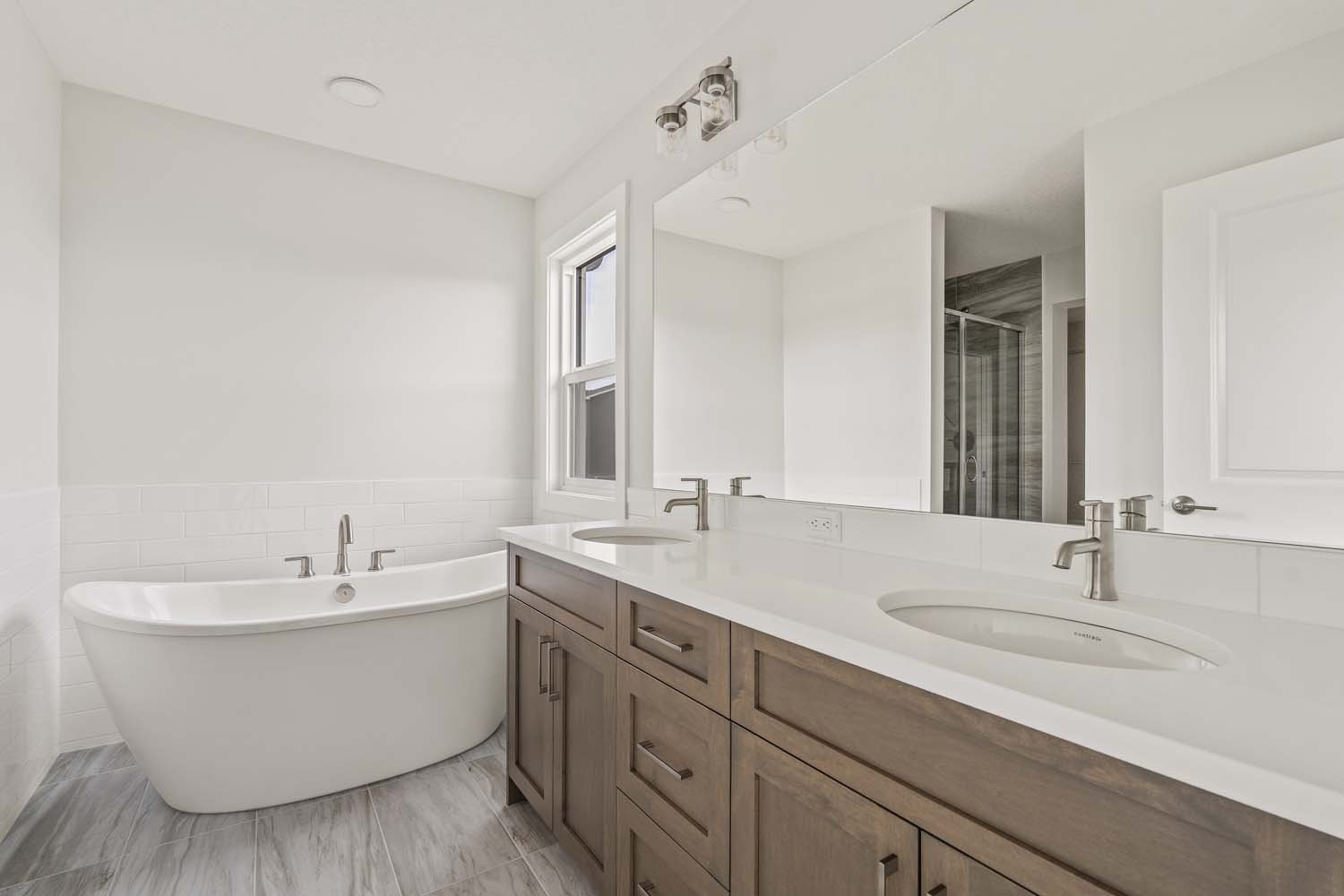 A photo of a quick possession home by Brookfield Residential located at 207 Lucas Gardens NW in Livingston, Calgary, Alberta.