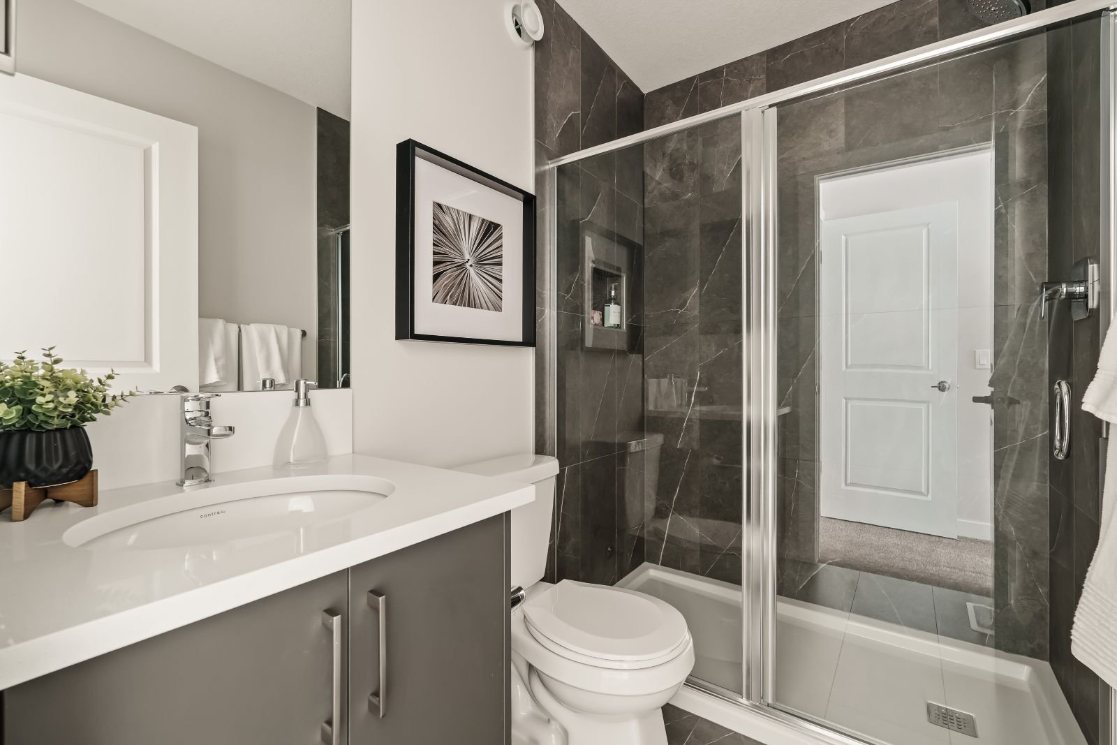 A photo of the bathroom in the Geranium townhome model in Taza Park by Brookfield Residential