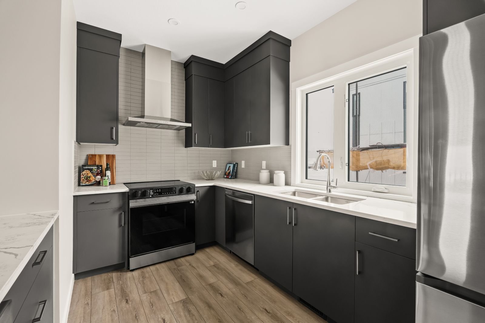 A photo of the kitchen in the Geranium townhome model in Taza Park by Brookfield Residential