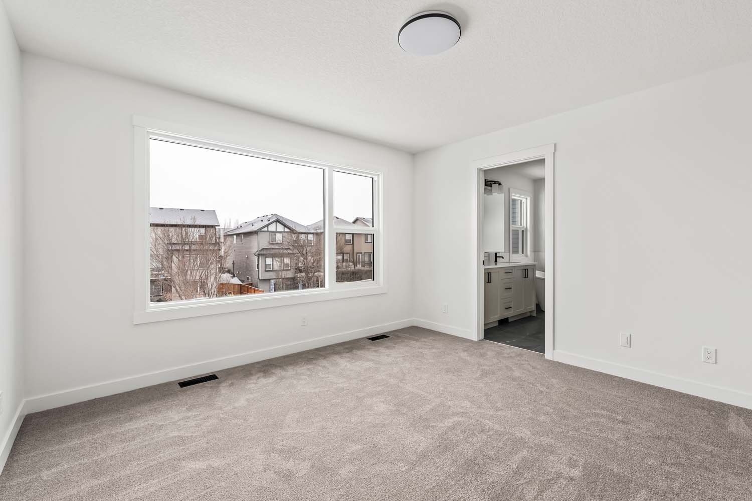 A photo of a quick possession home by Brookfield Residential, located at 215 Silver Spruce Grove SW in Silver Spruce, Calgary, Alberta.