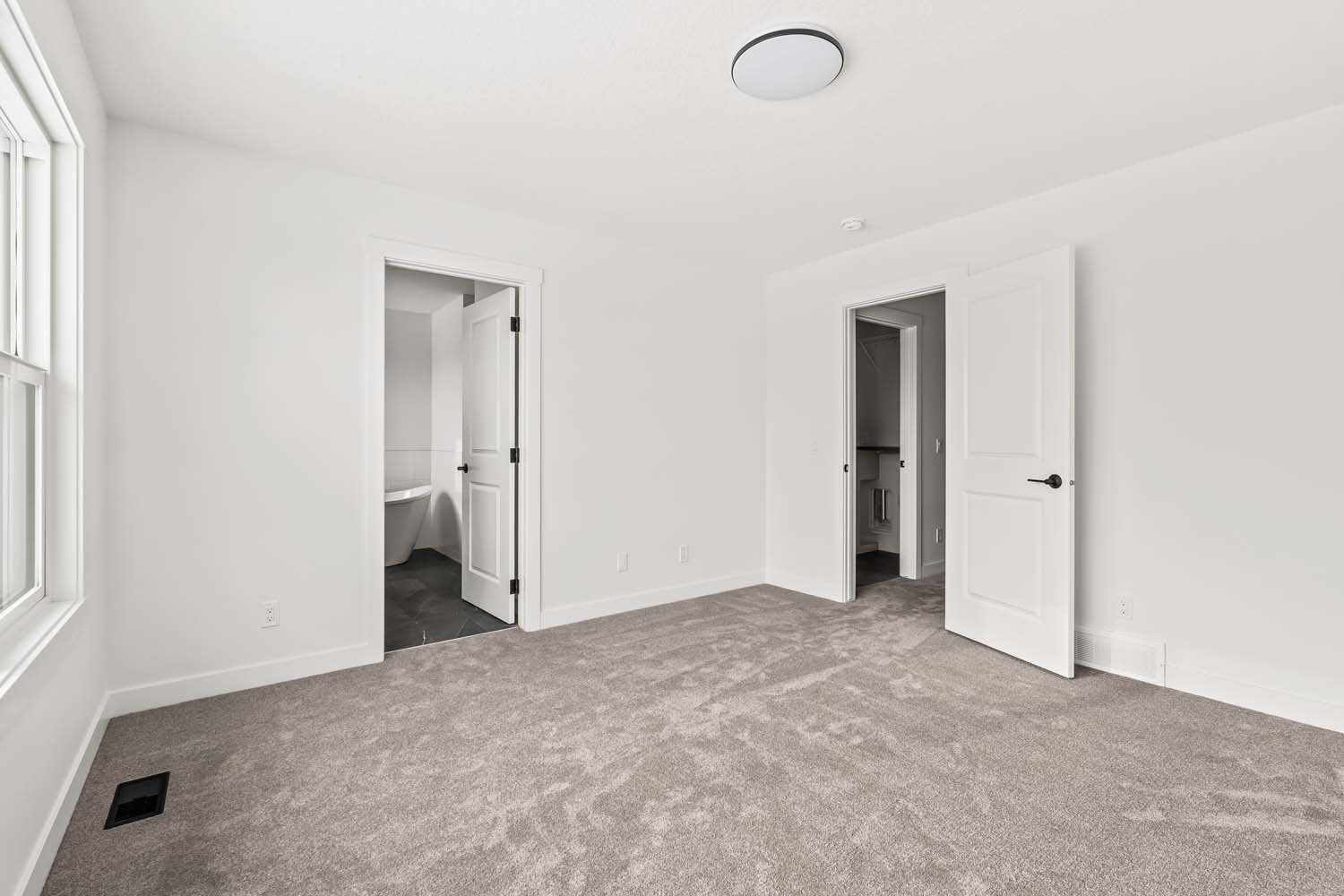 A photo of a quick possession home by Brookfield Residential, located at 215 Silver Spruce Grove SW in Silver Spruce, Calgary, Alberta.