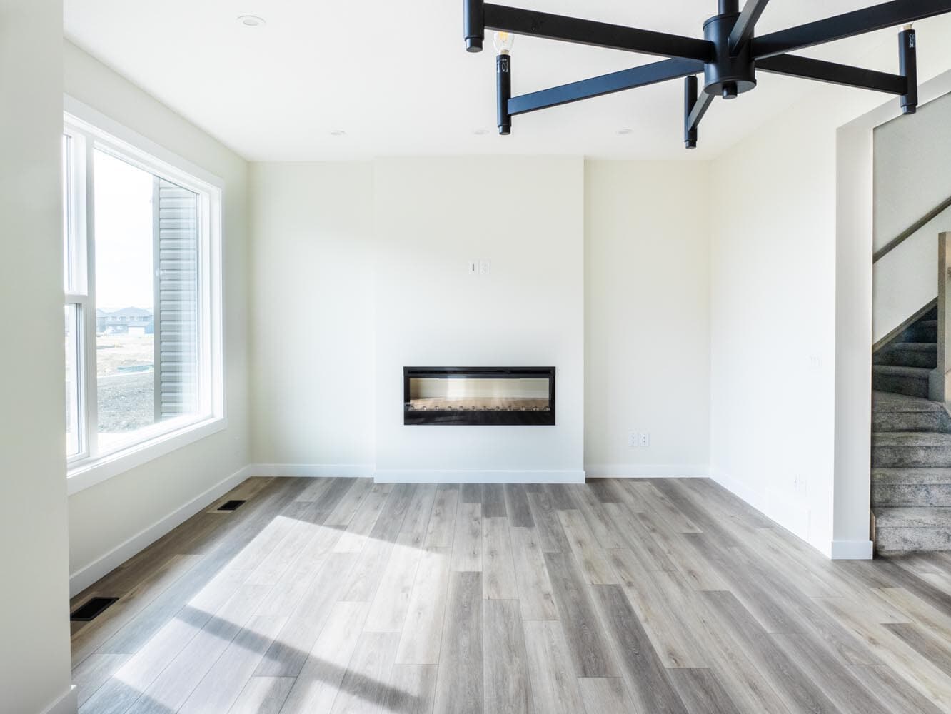 A photo of the front garage quick possession home at 143 Creekstone Circle SW in Creekstone by Brookfield Residential