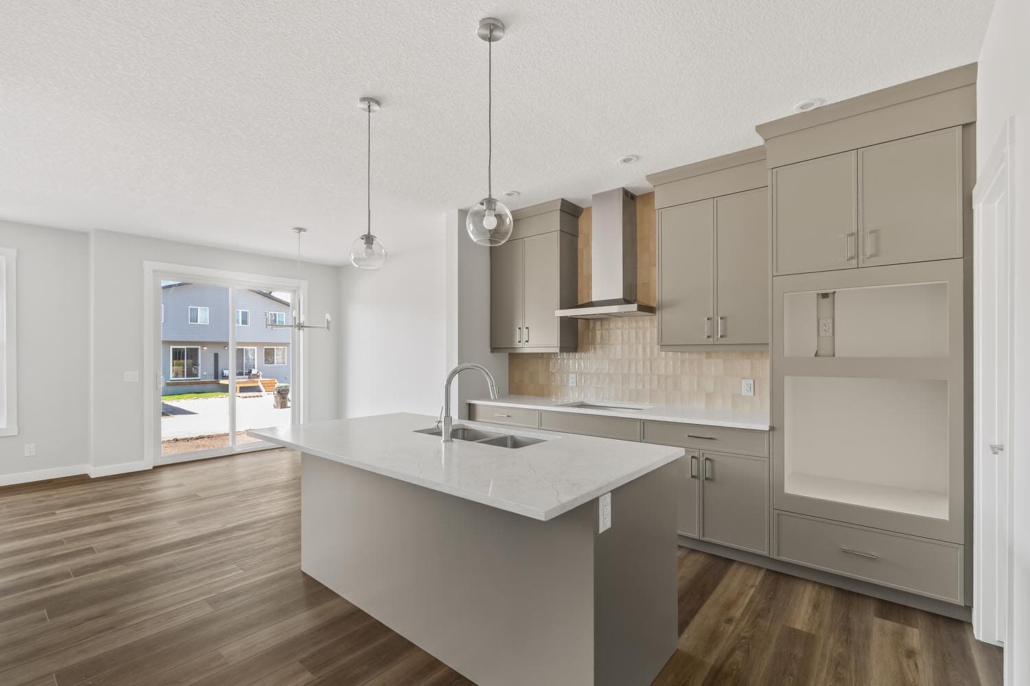 A photo of the front garage quick possession home at 144 Creekstone Circle SW in Creekstone by Brookfield Residential