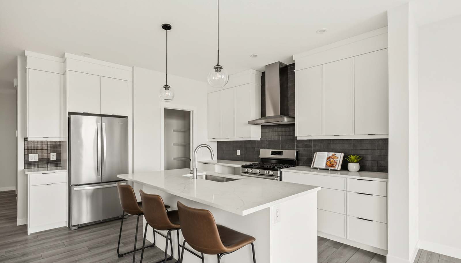 A quick possession home by Brookfield Residential in Creekstone located at 207 Creekstone Circle SW.