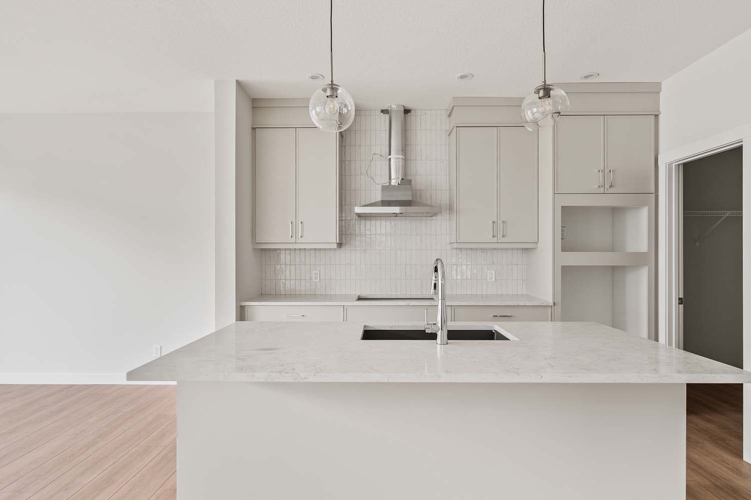 A photo of the quick possession home at 55 Silver Spruce Bay SW in Silver Spruce by Brookfield Residential