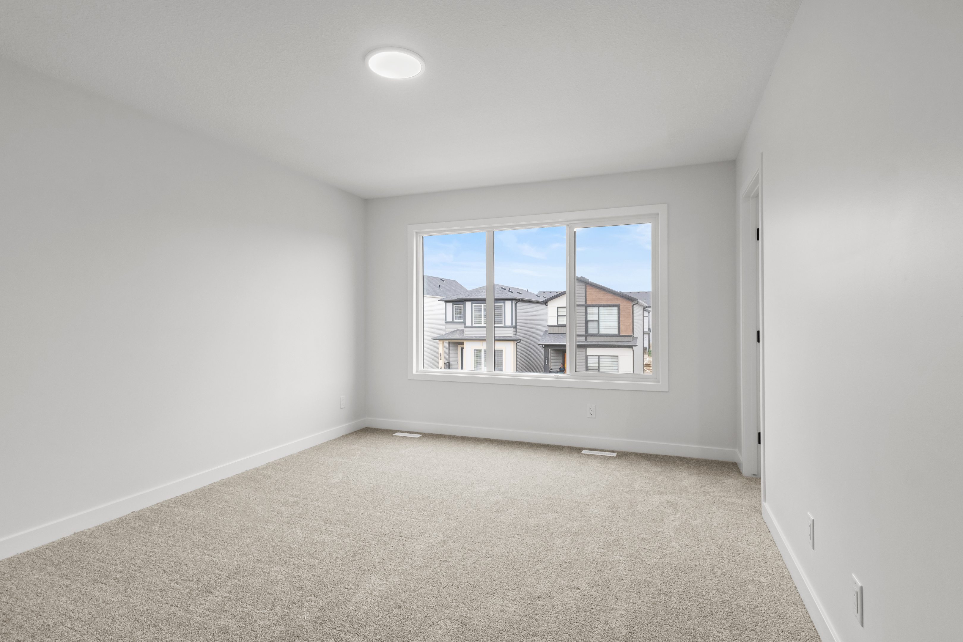 Bedroom in Edgemont by Brookfield Residential.
