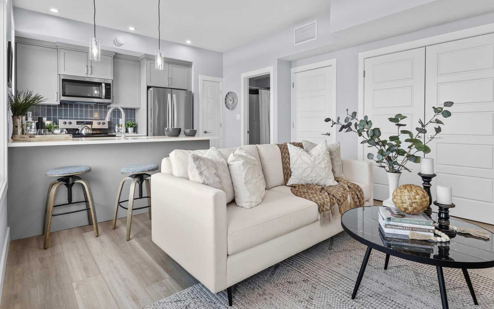 A photo of the great room of the Coltrane townhome model by Brookfield Residential