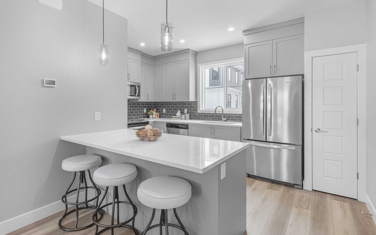A photo of the kitchen in the Gillespie 2 show home at The Everly in Edmonton by Brookfield Residential