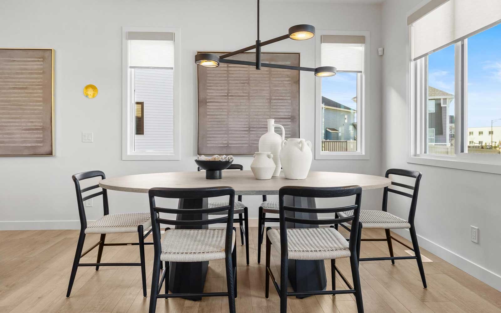 A photo of the dining area of the Sierra 24 model in Edmonton by Brookfield Residential