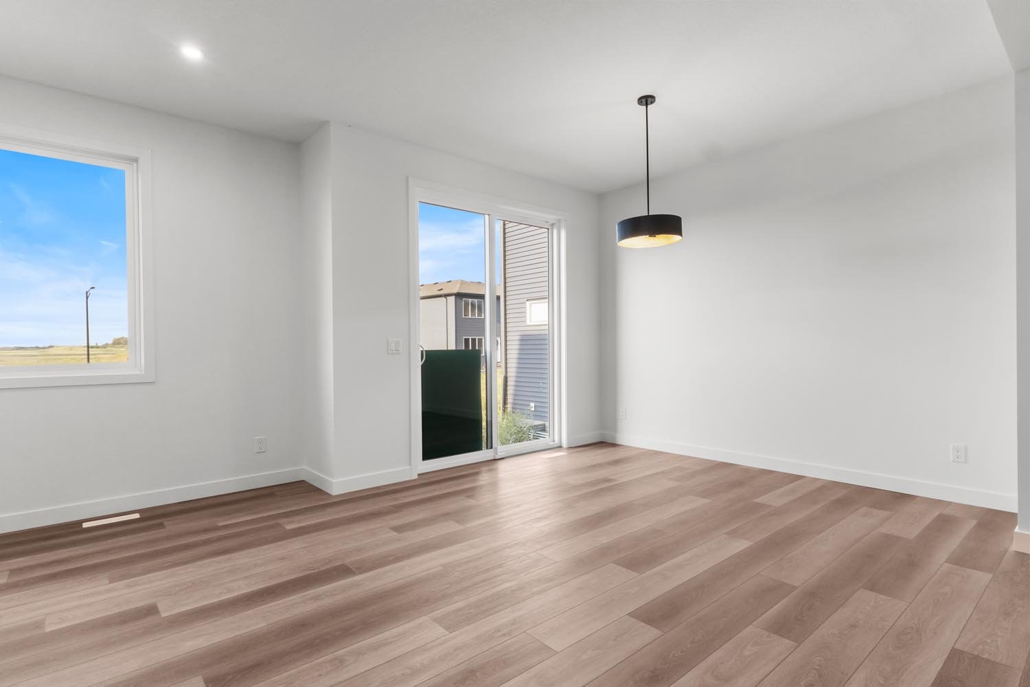 A photo of the front garage quick possession home at 2125 Muckleplum Crescent SW in The Orchards by Brookfield Residential