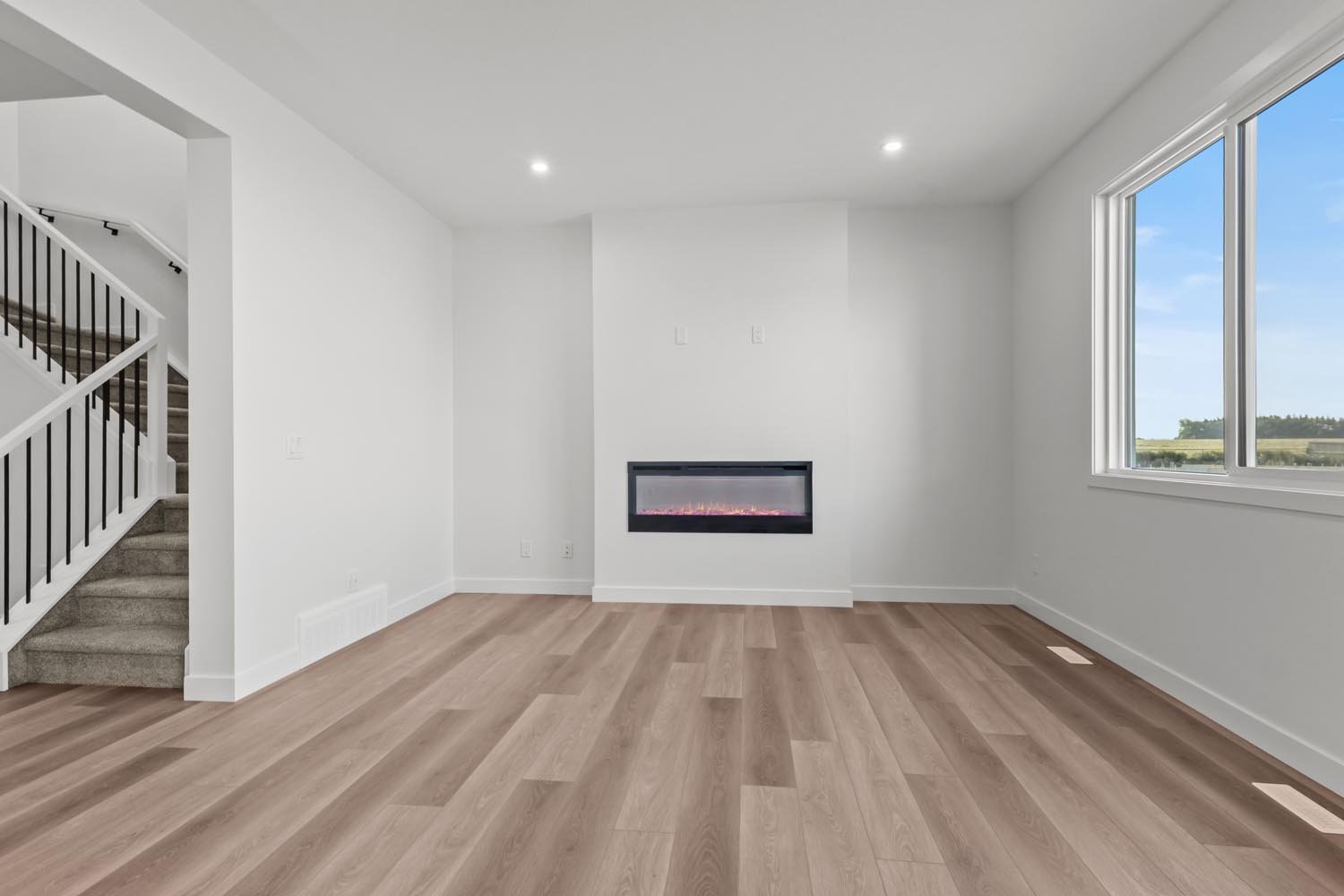 A photo of the front garage quick possession home at 2125 Muckleplum Crescent SW in The Orchards by Brookfield Residential