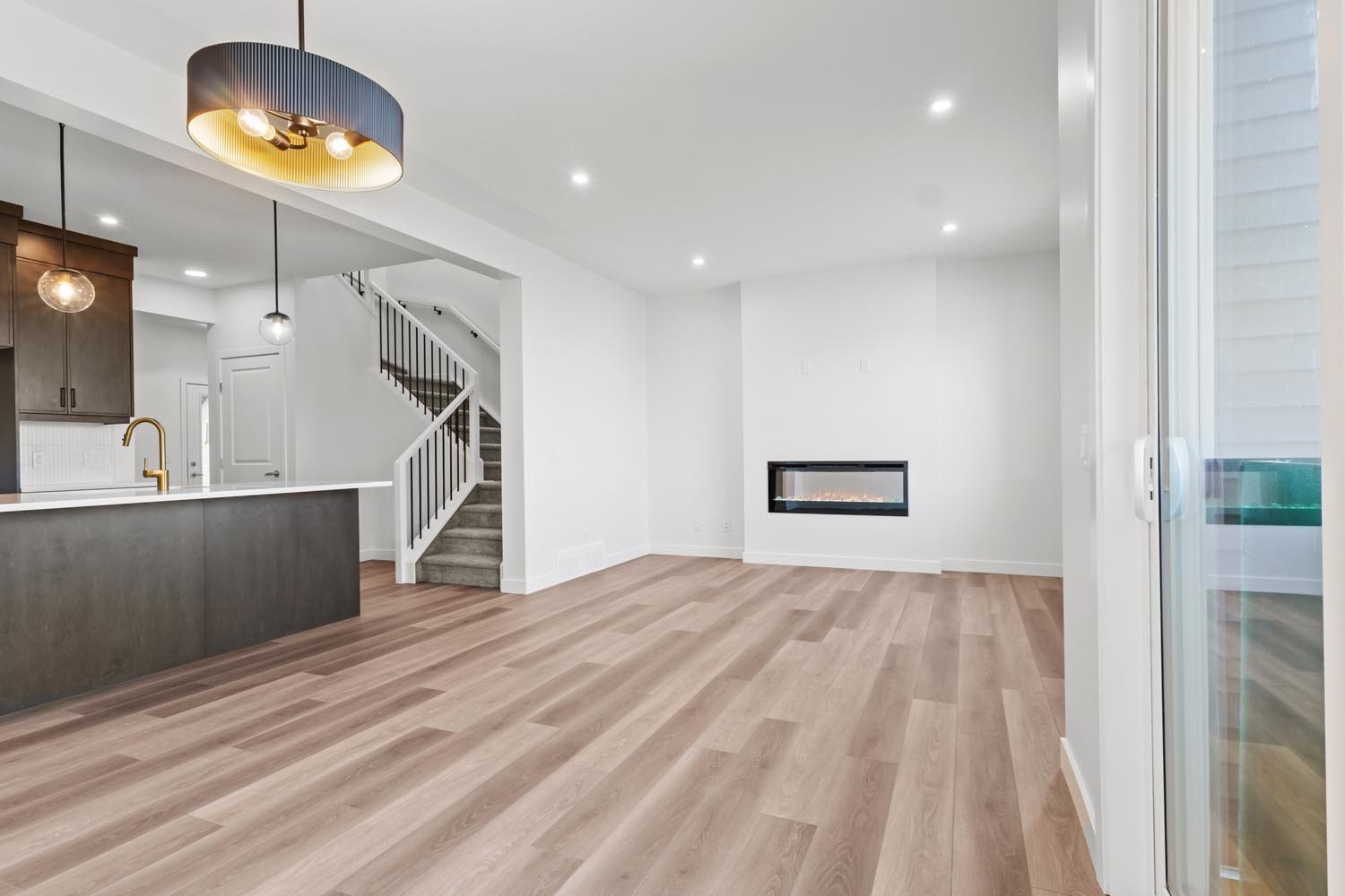 A photo of the front garage quick possession home at 2125 Muckleplum Crescent SW in The Orchards by Brookfield Residential