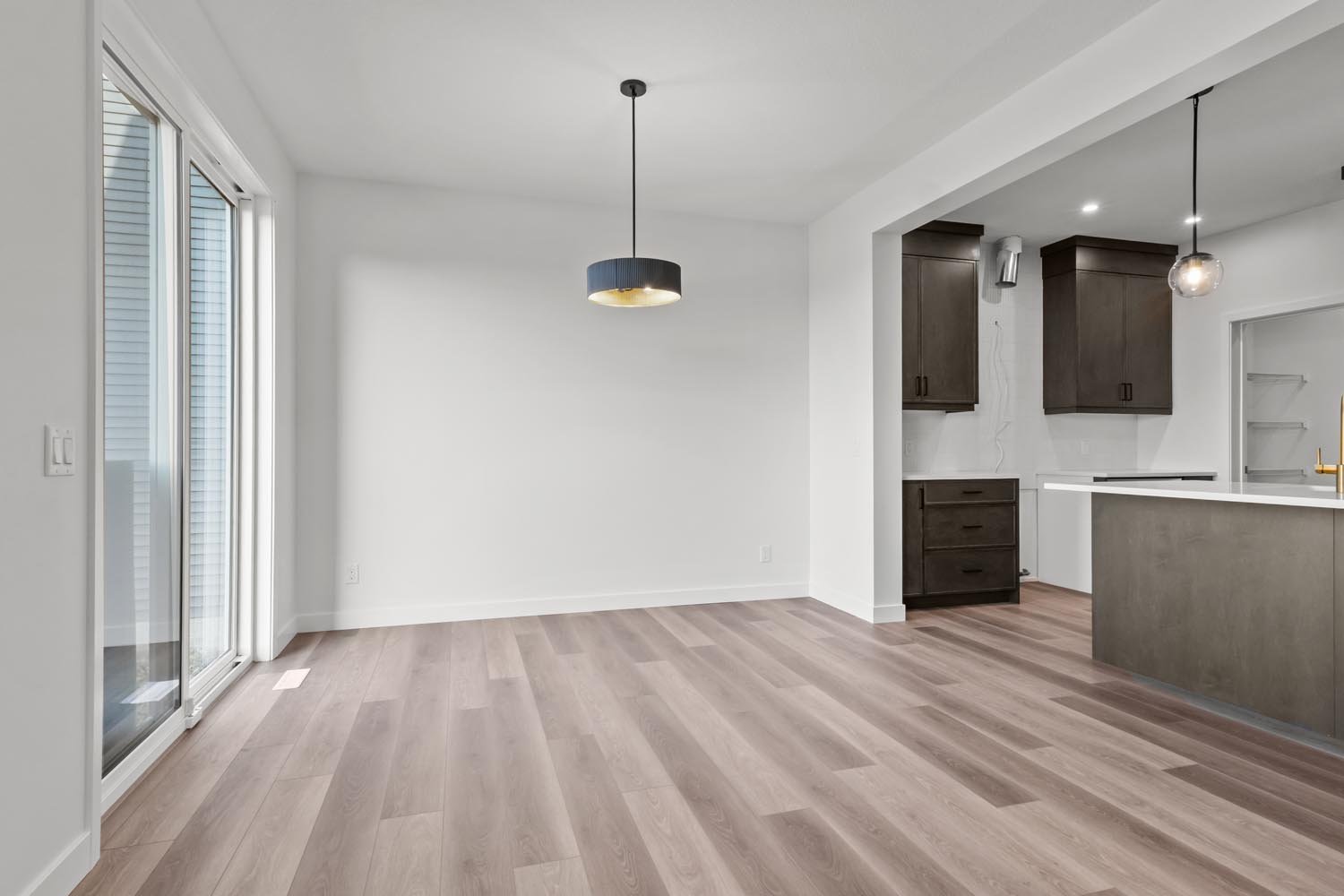 A photo of the front garage quick possession home at 2125 Muckleplum Crescent SW in The Orchards by Brookfield Residential