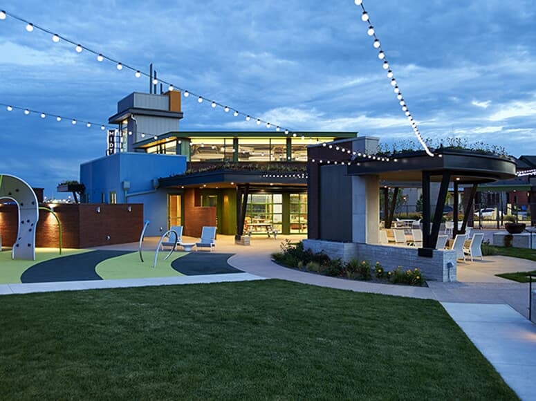 String lights on the exterior of The Shed at Midtown in Denver, CO