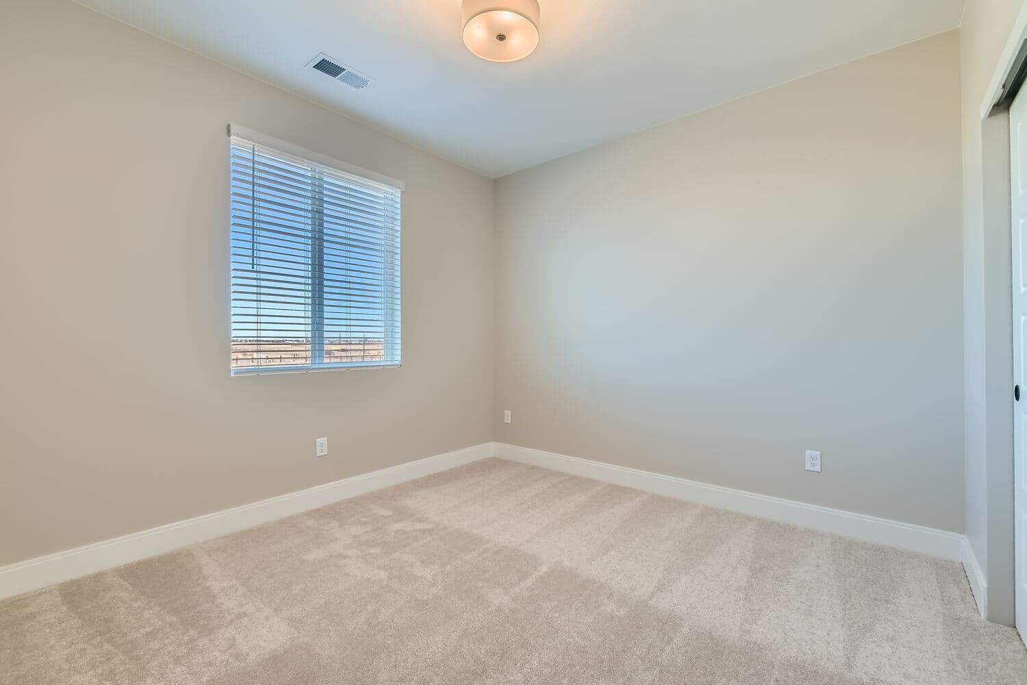 12920 Pinnacle Street Secondary Bedroom at Barefoot Lakes in Firestone, CO