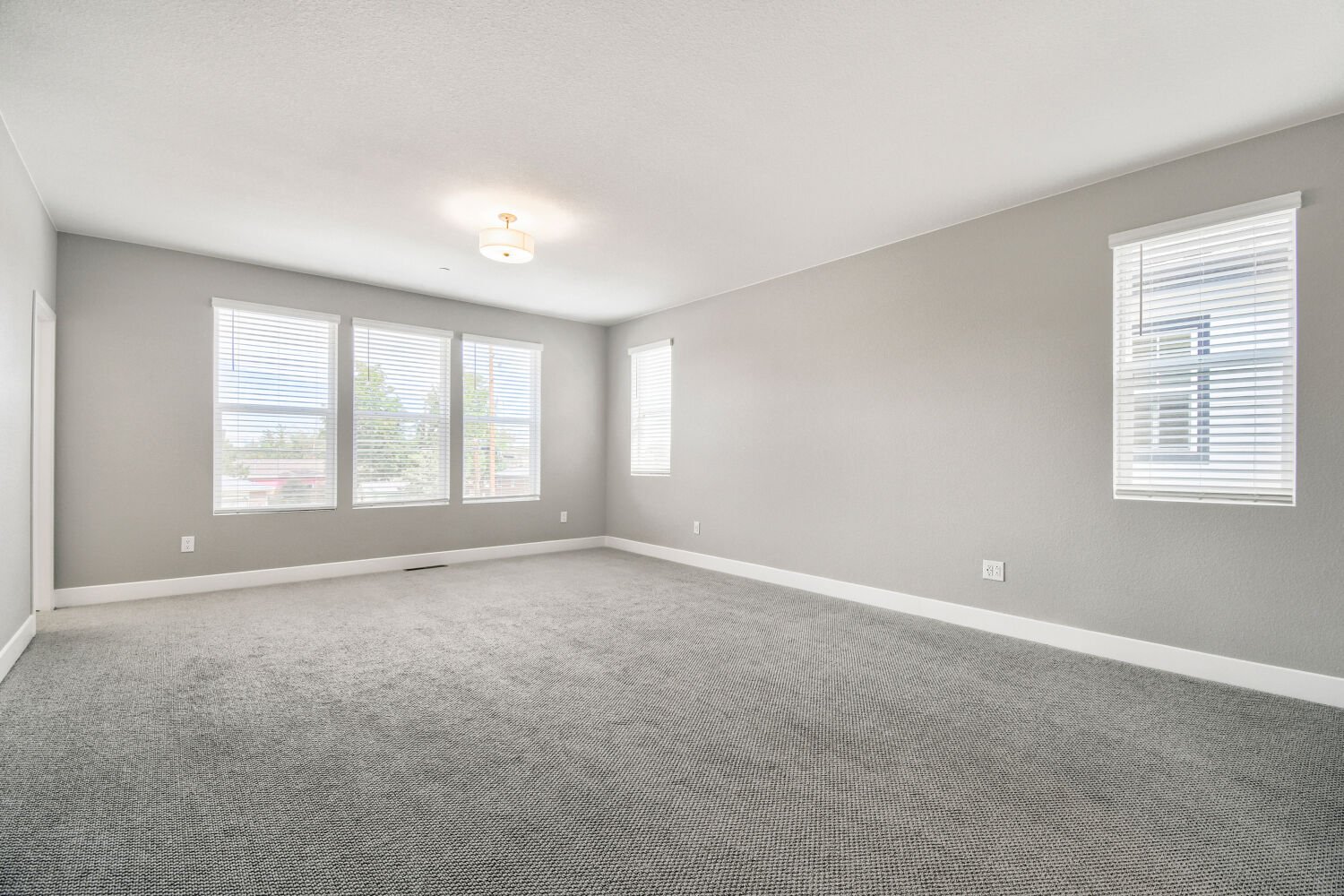 Spark Three Primary Bedroom at Uplands in Westminster, CO Spark Three Primary Bedroom at Uplands in Westminster, CO