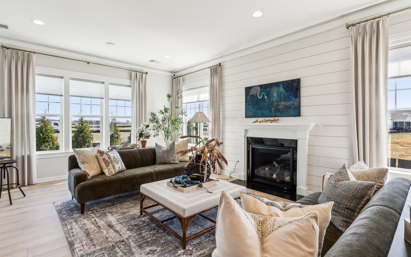 The family room of the Quincy II at Heritage Shores by Brookfield Residential.