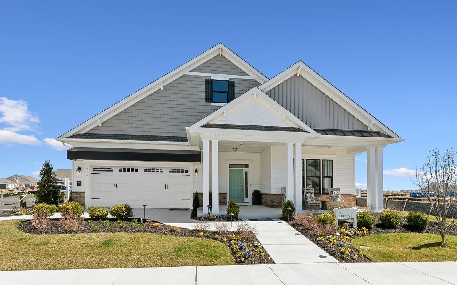 The front exterior of the Quincy II at Heritage Shores by Brookfield Residential.
