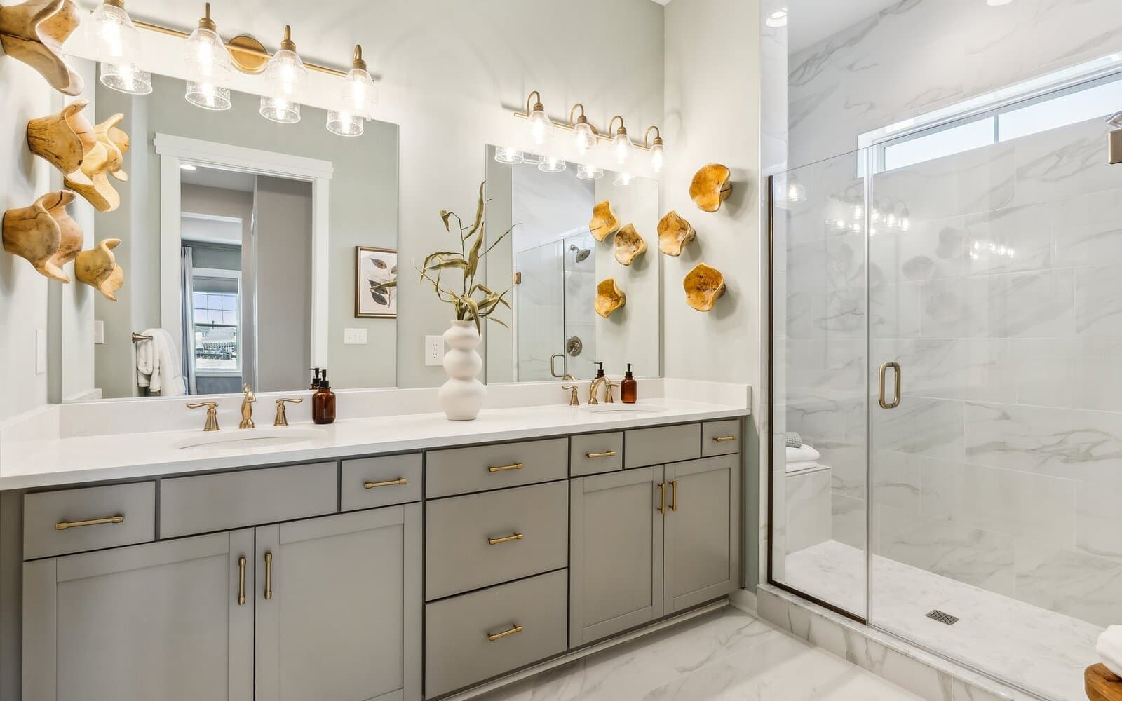 The main level primary bathroom the Quincy II at Heritage Shores by Brookfield Residential.
