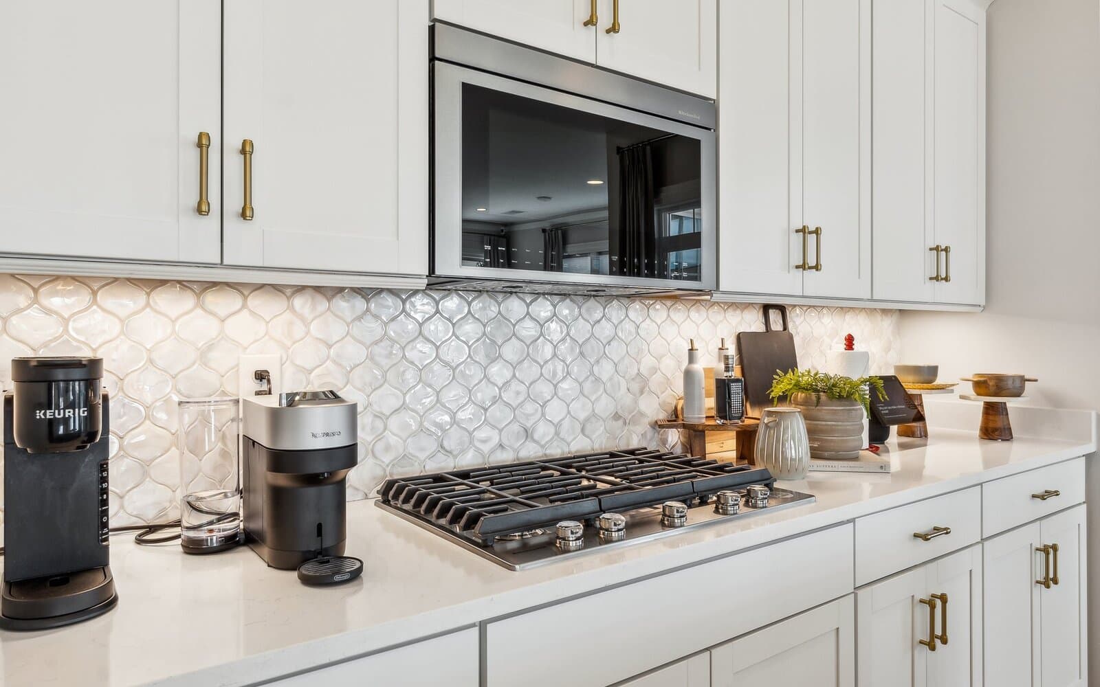 The kitchen of the Quincy II at Heritage Shores by Brookfield Residential.