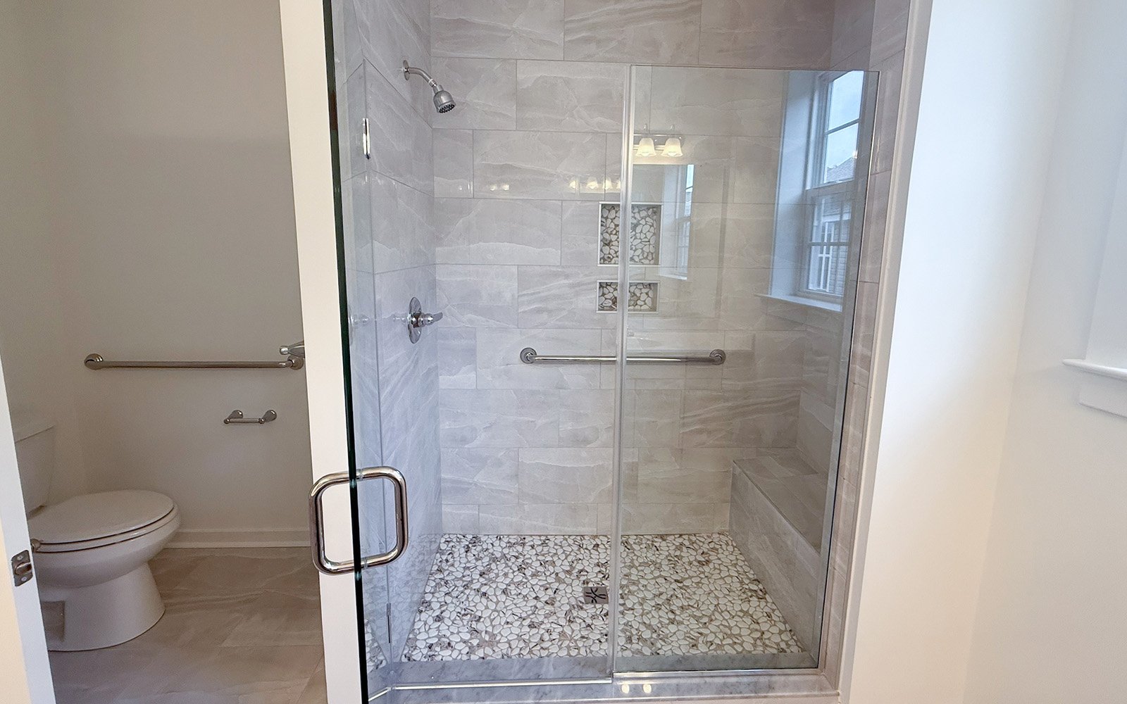 The primary bathroom of the Savoy II on homesite 1152 at Heritage Shores by Brookfield Residential.