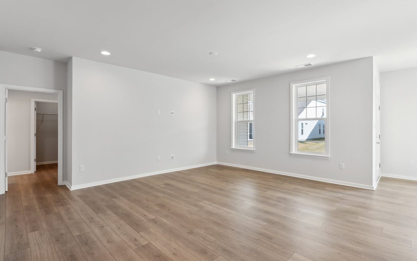 The family room of the Monet on homesite 983 at Heritage Shores by Brookfield Residential.