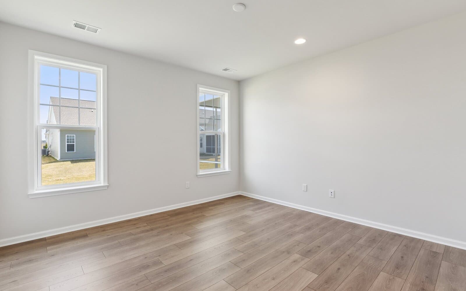 The primary bedroom of the Monet on homesite 983 at Heritage Shores by Brookfield Residential.