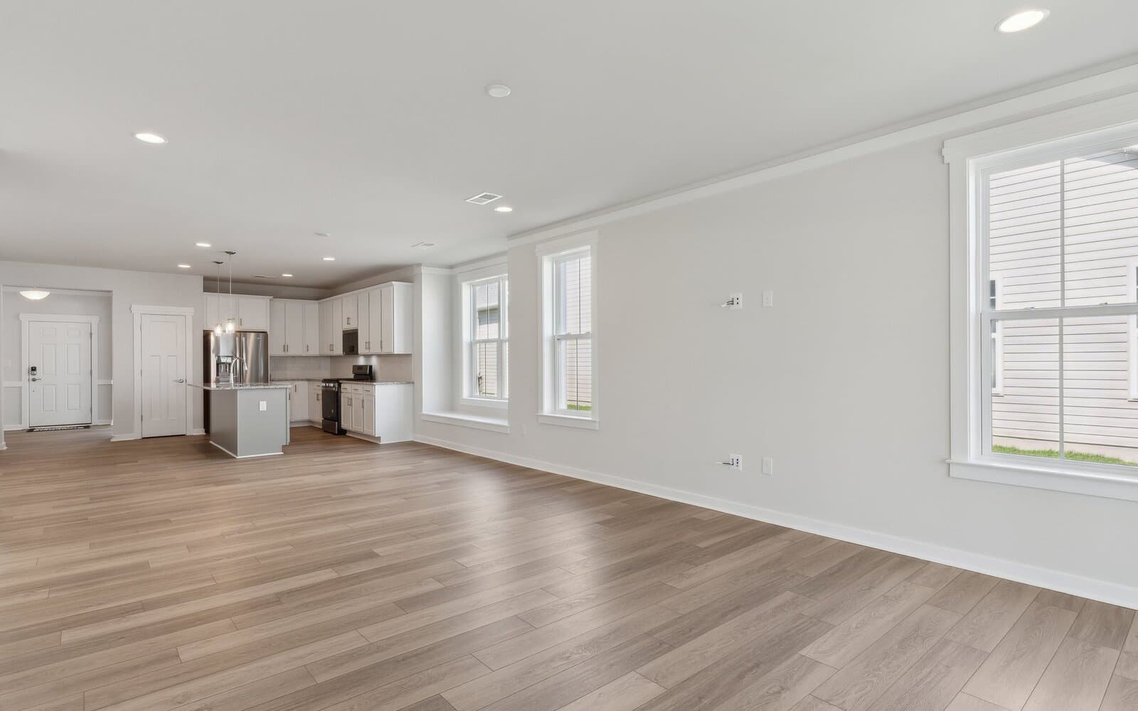 The family room of the Picasso on homesite 986 at Heritage Shores by Brookfield Residential.
