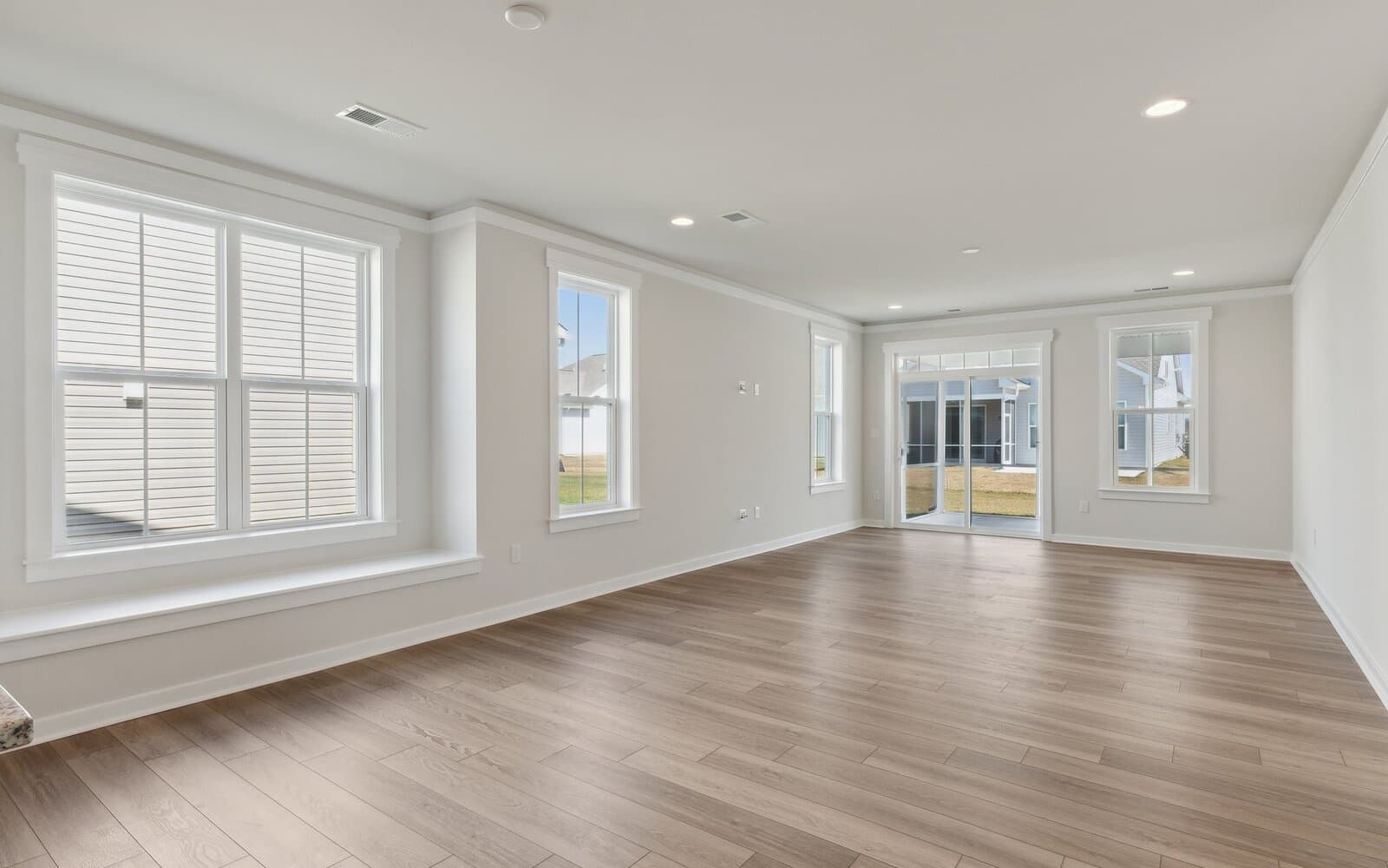 The family room of the Picasso on homesite 986 at Heritage Shores by Brookfield Residential.