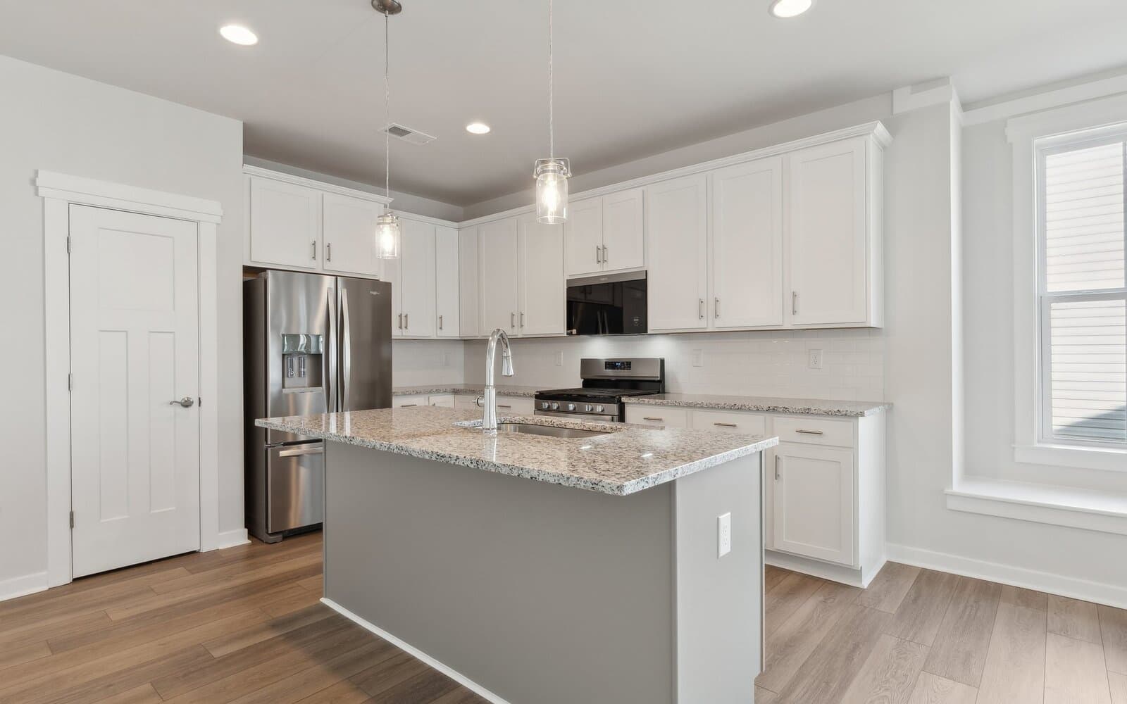 The kitchen of the Picasso on homesite 986 at Heritage Shores by Brookfield Residential.