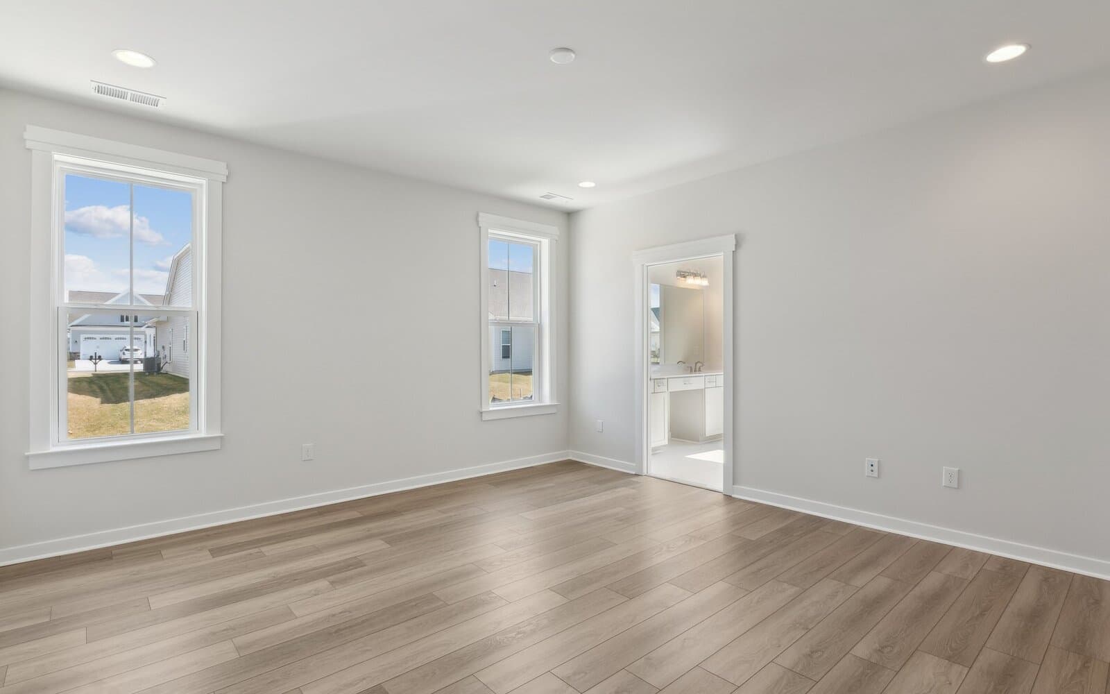 The primary bedroom of the Picasso on homesite 986 at Heritage Shores by Brookfield Residential.