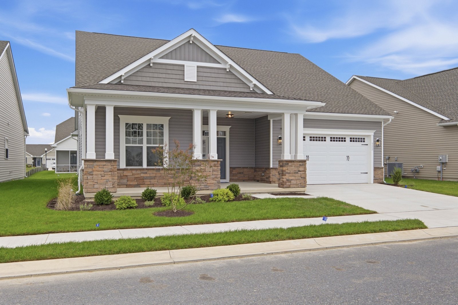 The front exterior of the Quincy II on homesite 988.