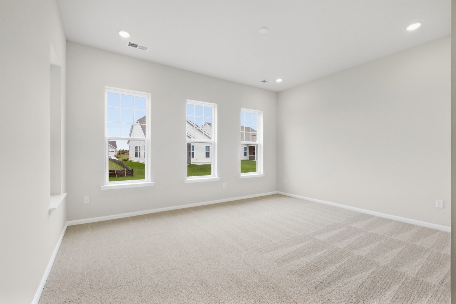The main level primary suite of the Savoy II on homesite 989.
