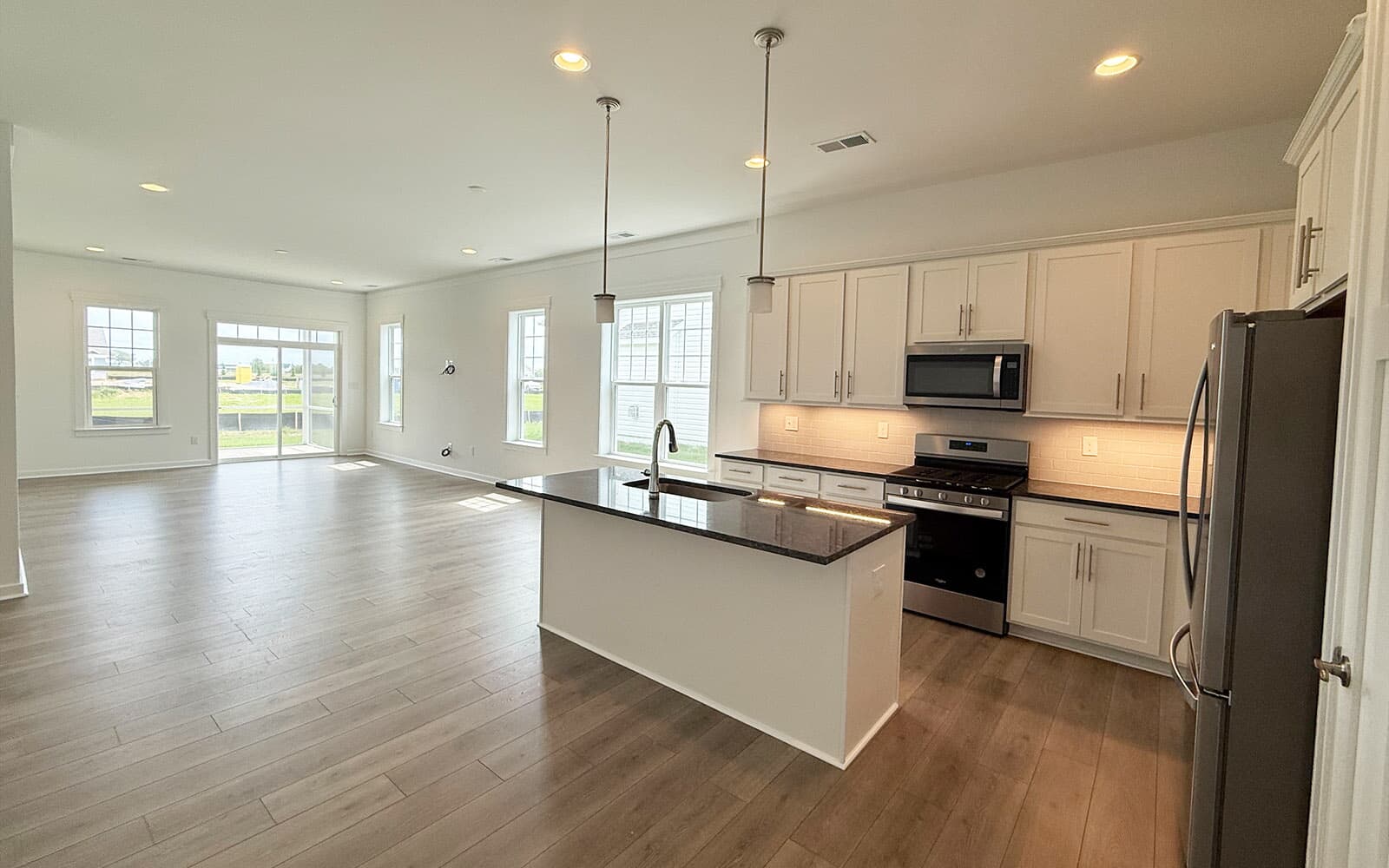 The main level living area of the Picasso at Heritage Shores on homesite 991. 