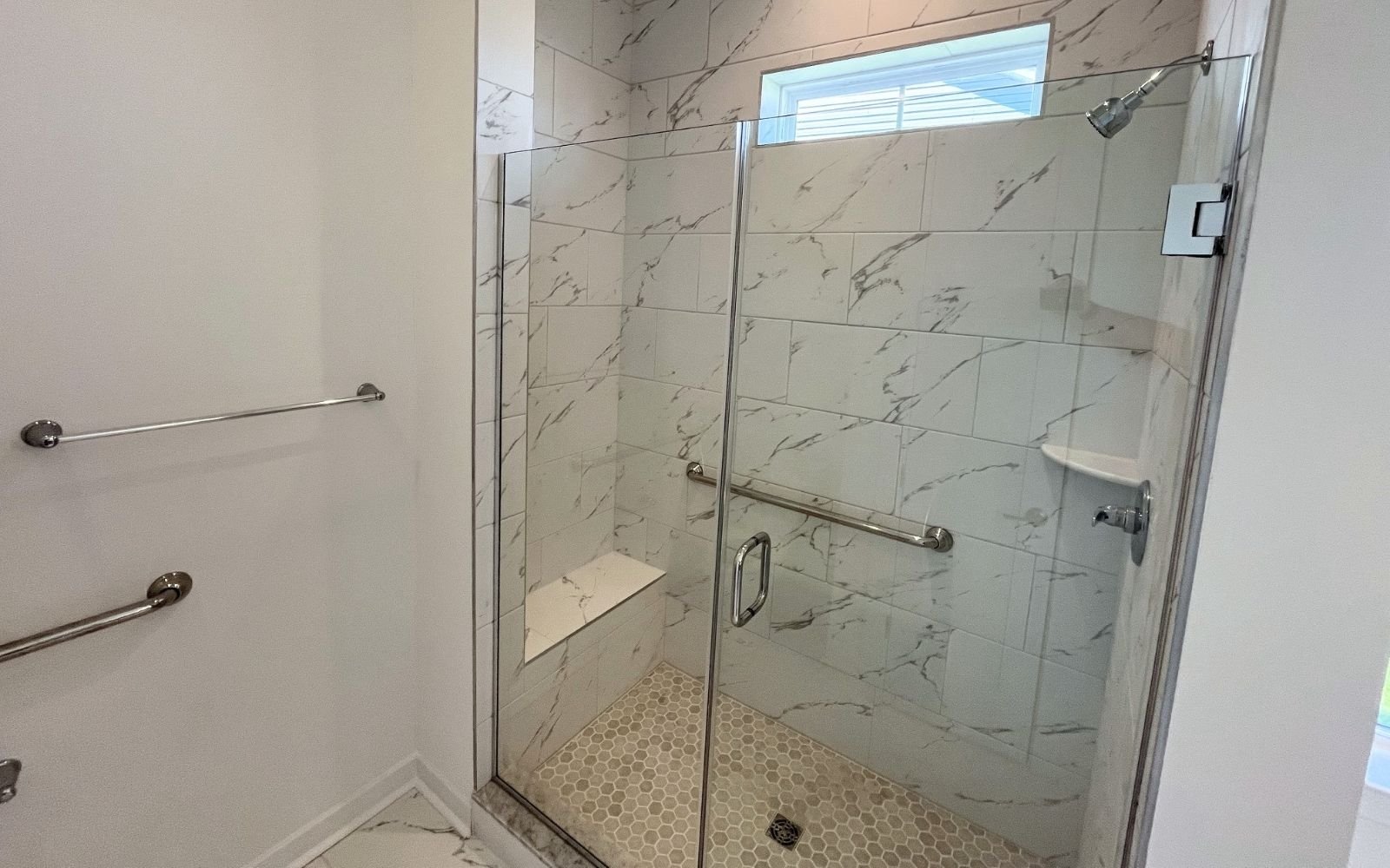 The primary bathroom shower of the Picasso on homesite 991 at Heritage Shores.