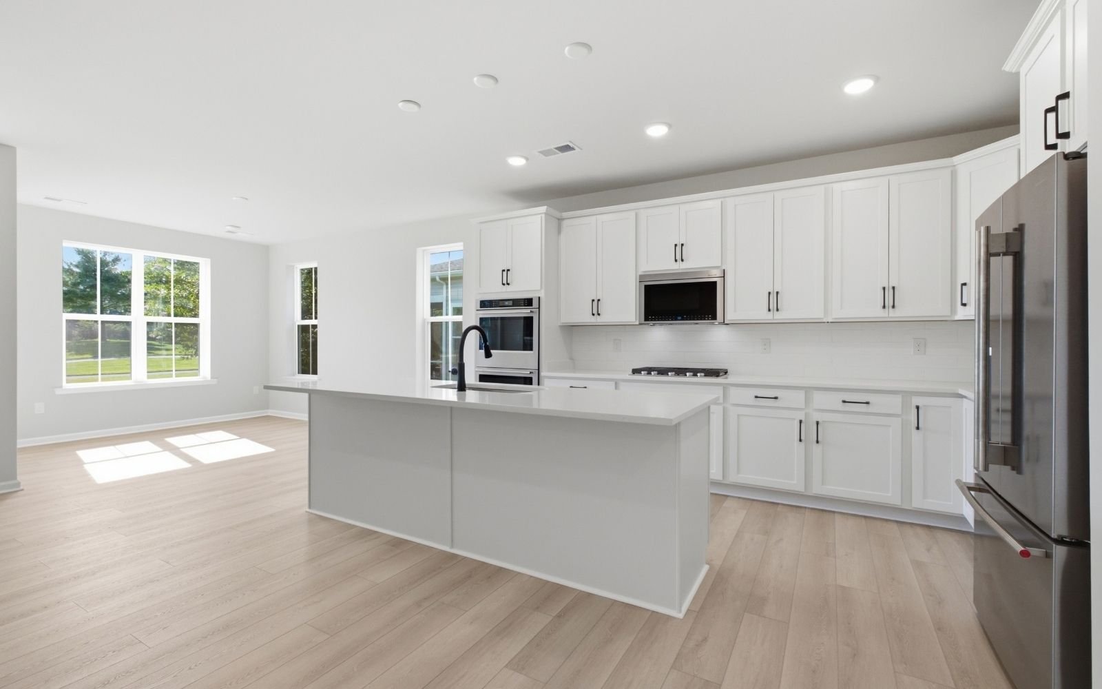 The kitchen and dining room of the Monet at Heritage Shores.