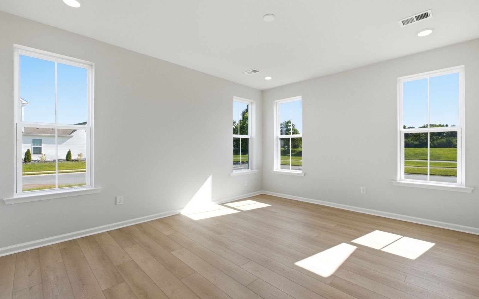 The primary bedroom of the Monet at Heritage Shores.