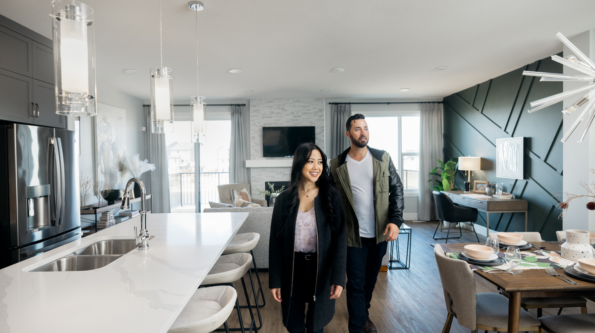 Couple walking through a Brookfield Residential home