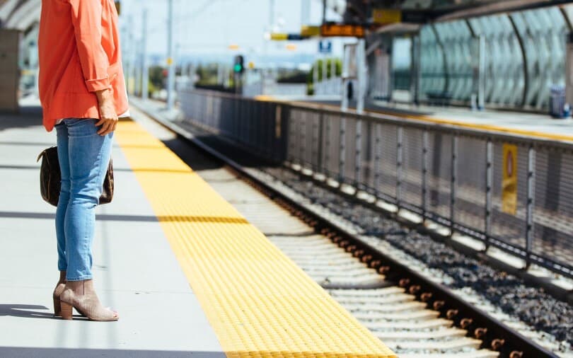 Woman waiting for a train