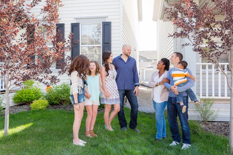 Neighbours gathering in front of their Brookfield Residential homes in Edmonton