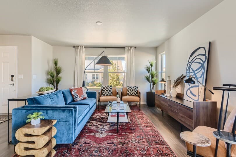 Living area in the Essence Portfolio at Brighton Crossings by Brookfield Residential in Denver CO