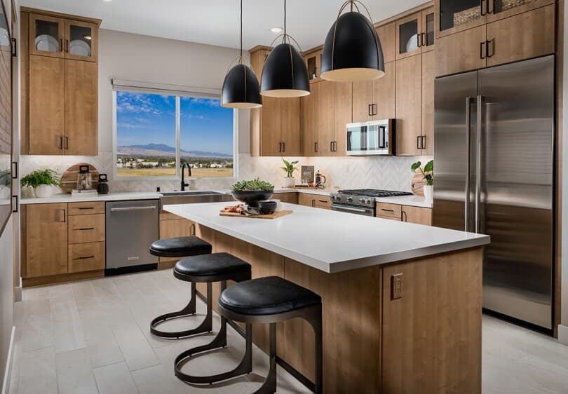 Wood tone kitchen in Plan 1 at Luna at The Landing by Brookfield Residential in Tustin CA