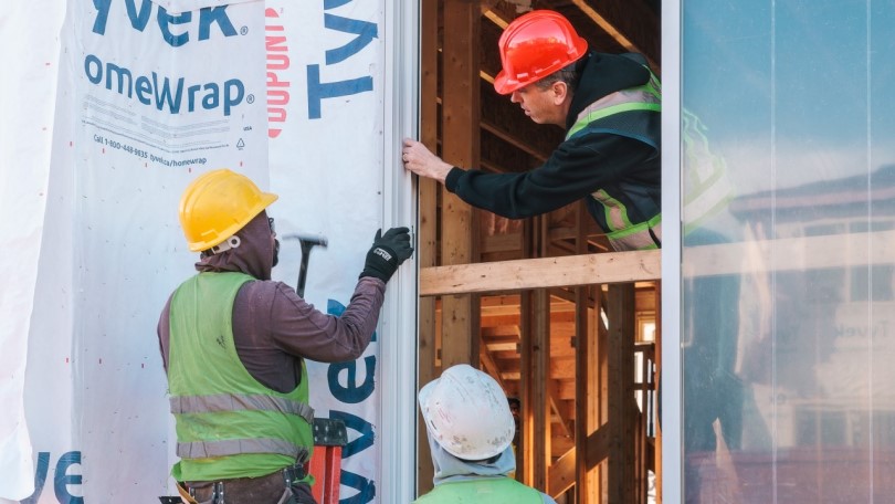 Workers building a Brookfield Residential home