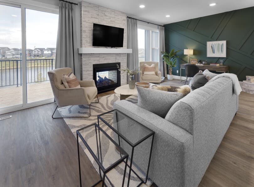 Stone fireplace in the great room in Hudson at Chappelle Gardens in Edmonton