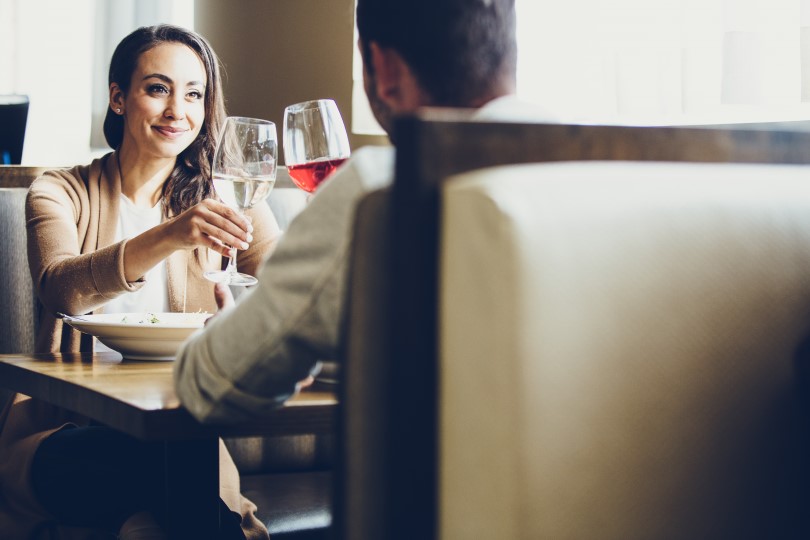 Couple toasting at a restaurant