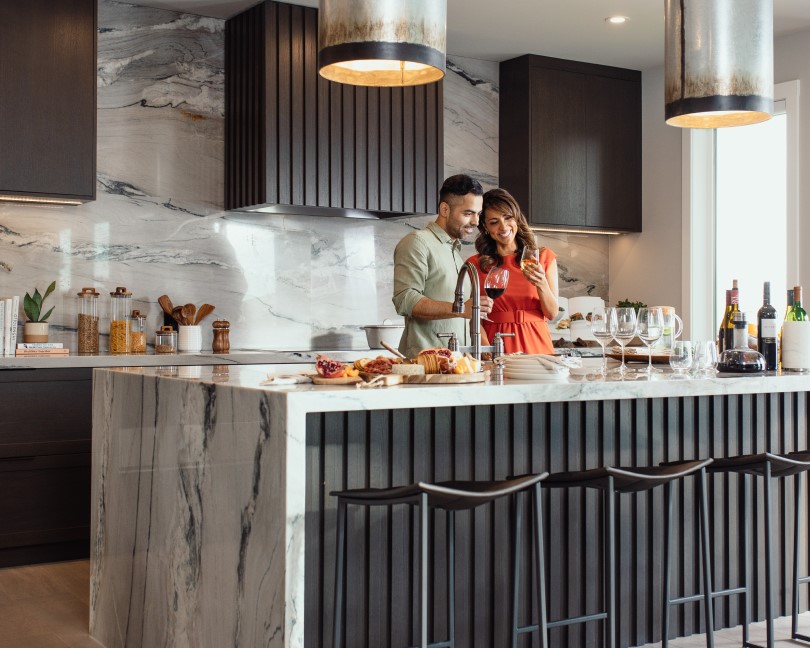 Couple in their Brookfield Residential kitchen in Calgary AB