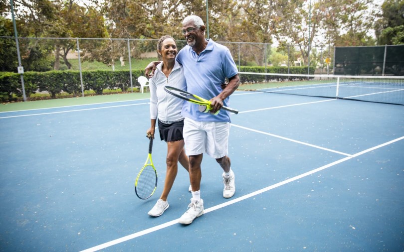 Couple leaving the tennis courts at Heritage Shores in Bridgeville DE