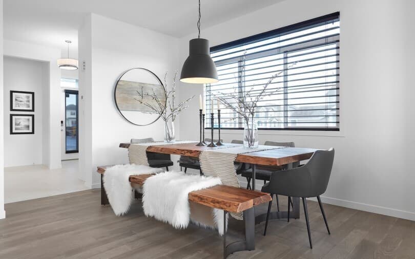 Elegant dining table with sheepskin throw at Edgemont in Edmonton AB